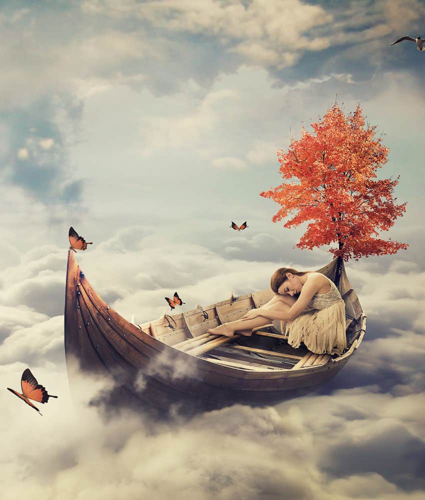 Dreaming person in boat travels through clouds