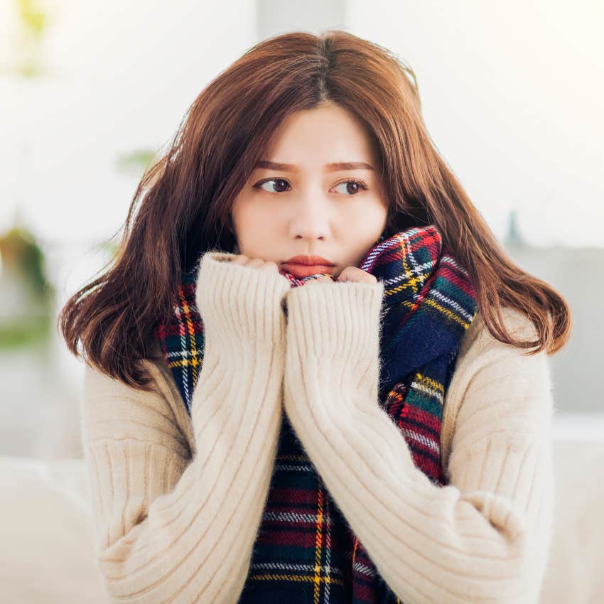 woman who always feels cold as she owns way too many sweaters