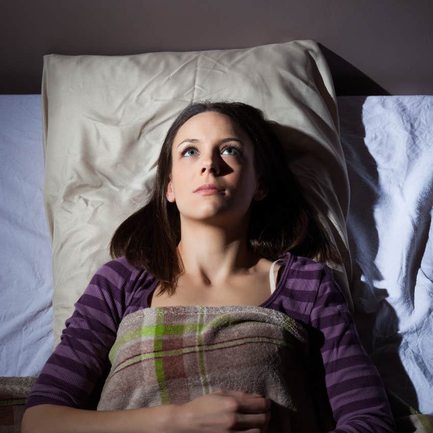 woman sleeping with lights on