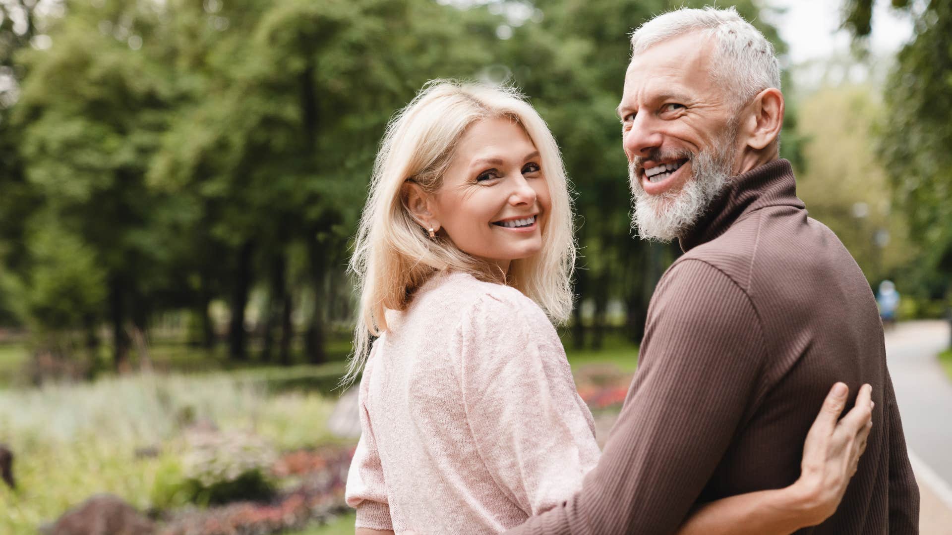happy couple walking together outside