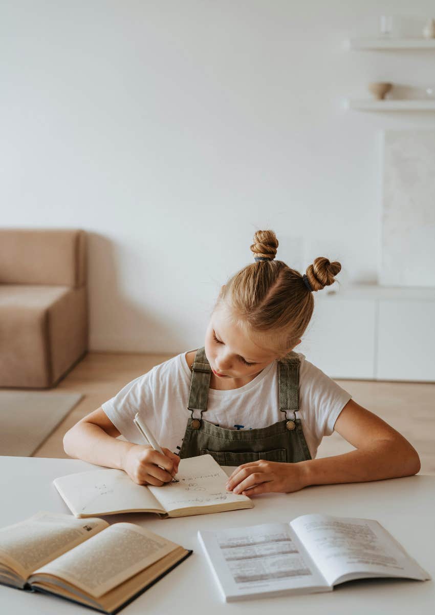 young girl doing school work