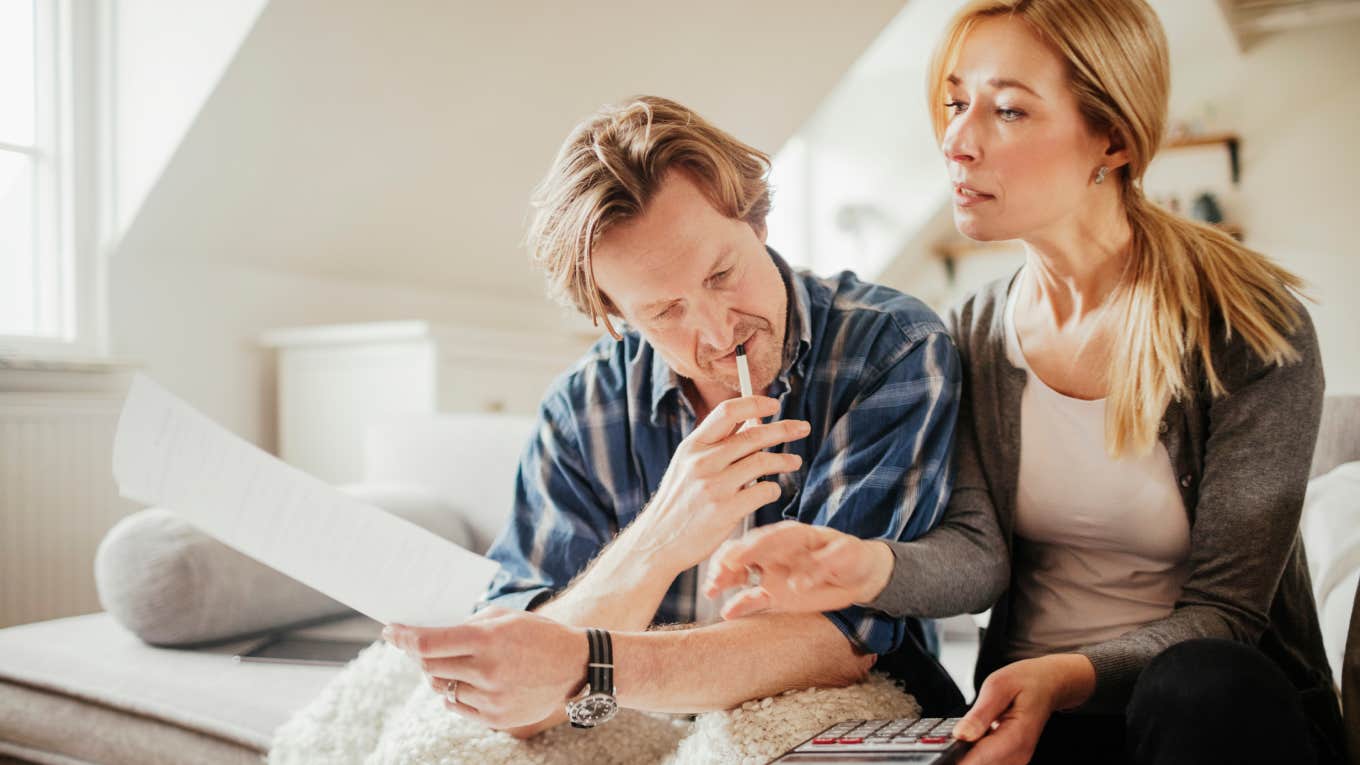 The Necessities People Have Been Forced To Give Up Just To Keep The Power On couple going over their finances