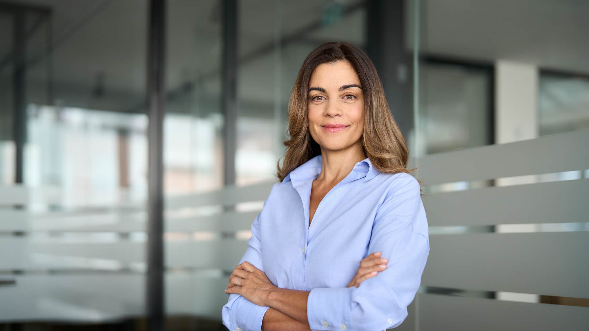 things adults with actual morals are tired of at this stage of their lives those who confuse their kindness with weakness woman in blue crossing arms looking confident as people confuse their kindness with weakness