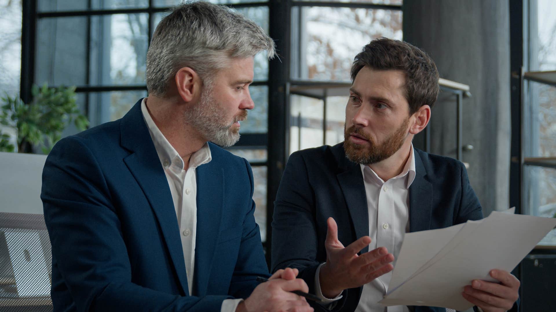 Man arguing about working hard with little recognition or reward.