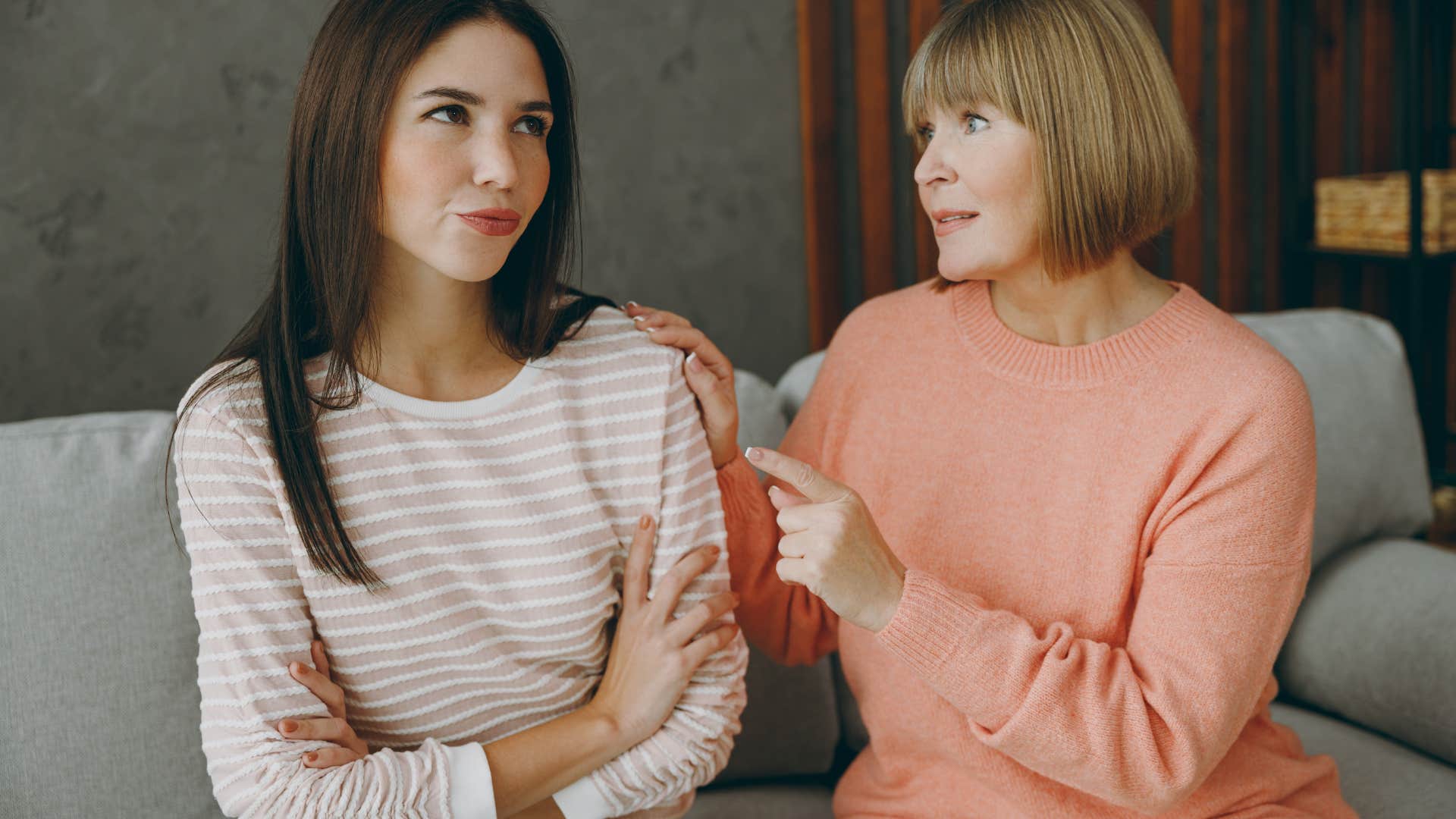annoyed woman listening to mom talk