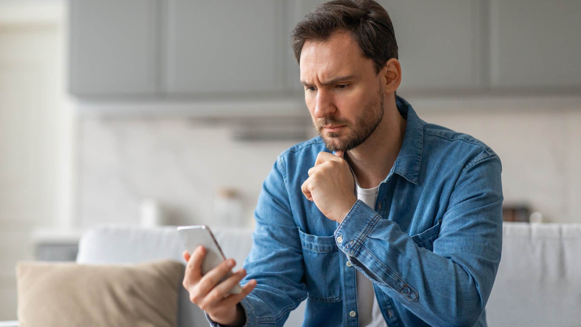 man looking at supplies on his phone just in case