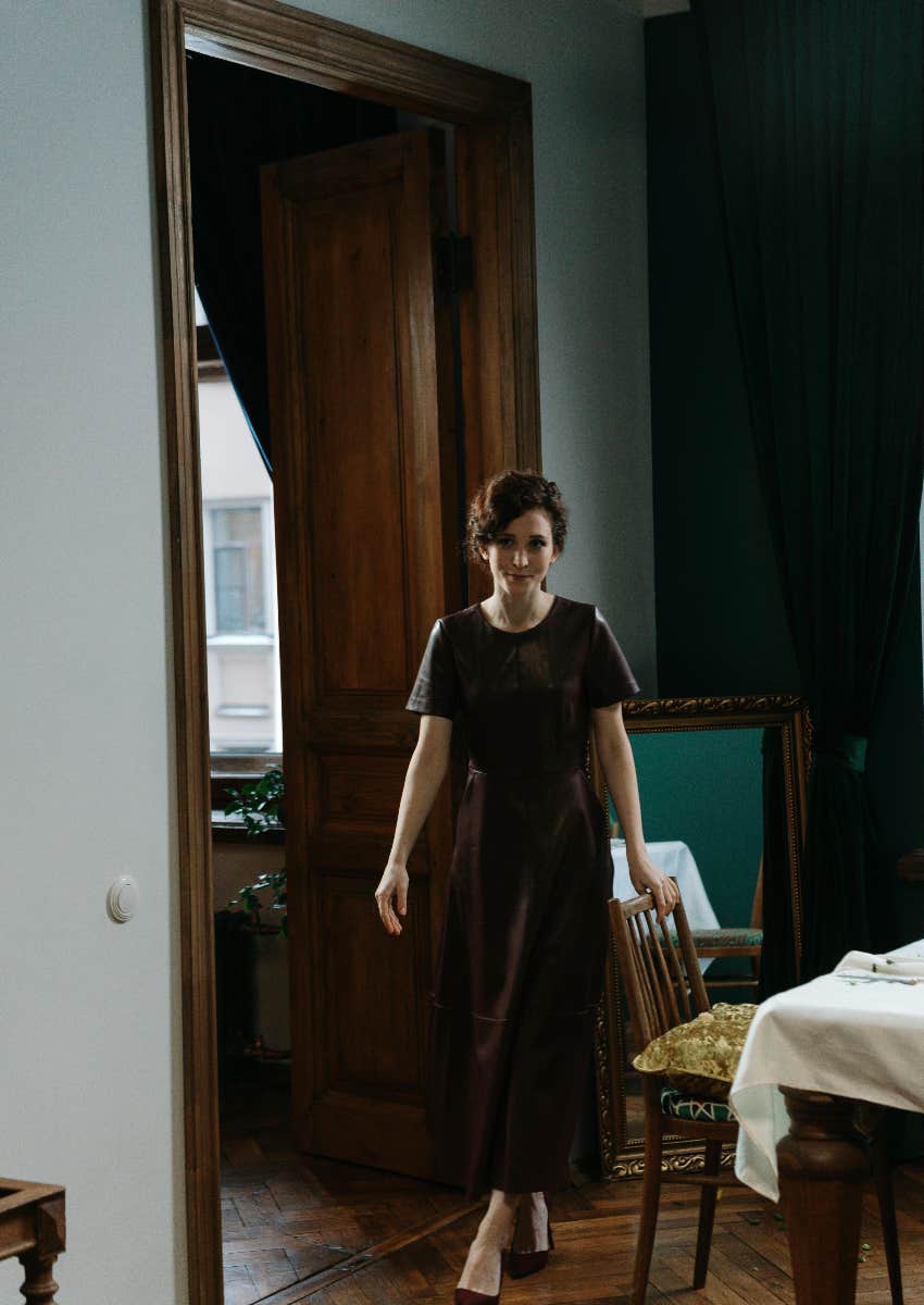woman entering a room