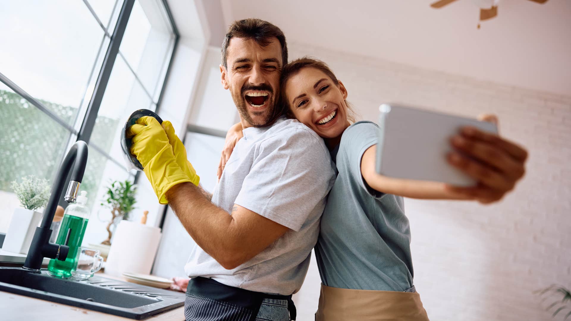 Healthy couple tidy kitchen