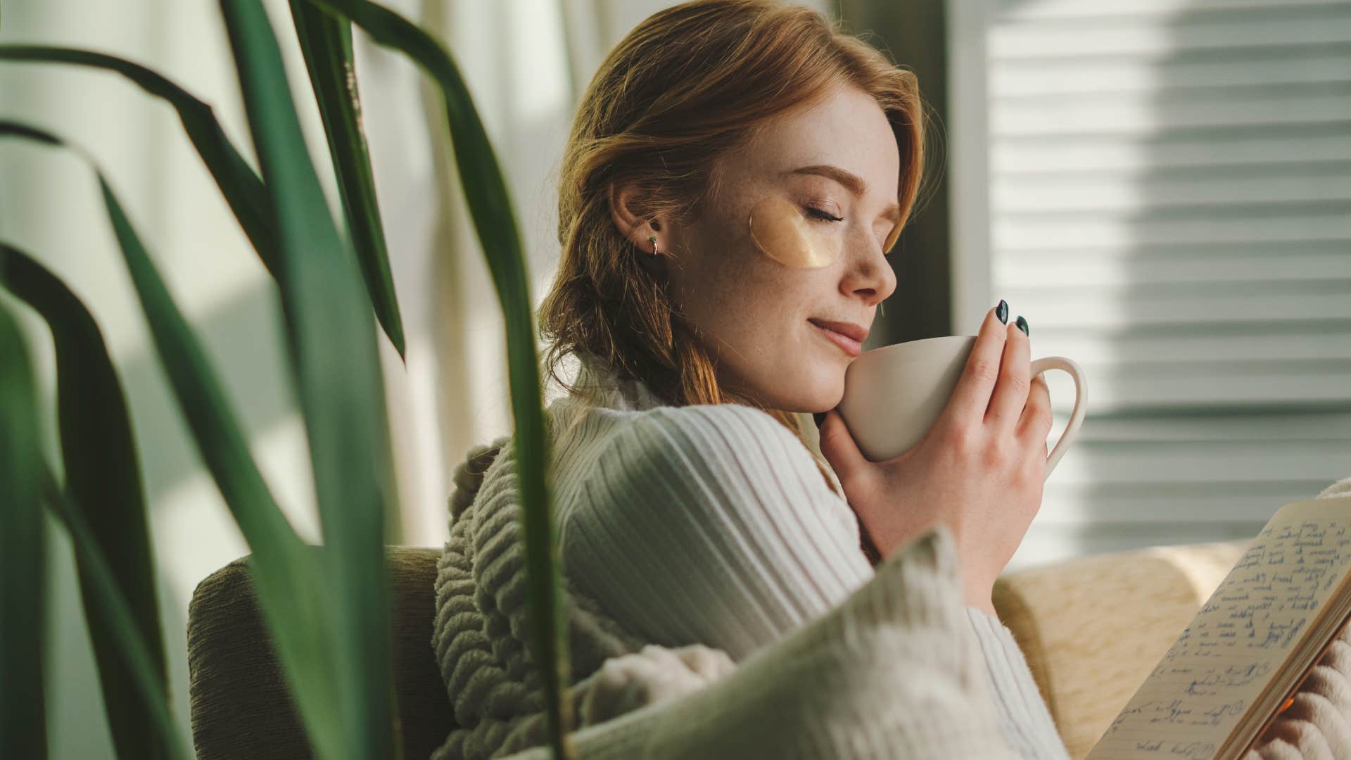 happy millennial woman making cozy a lifestyle drinking tea