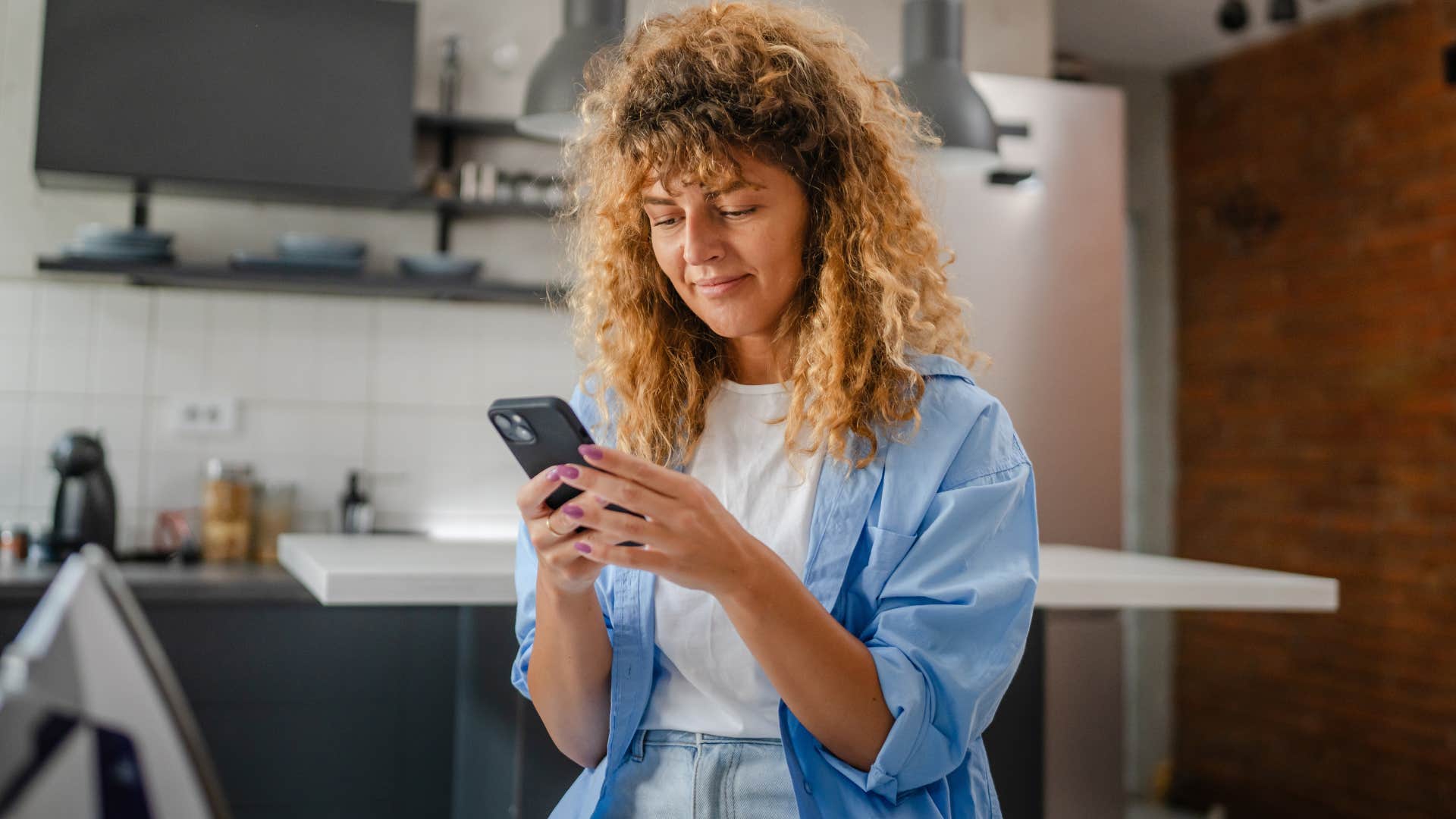 woman on her phone turning hobbies into side hustles