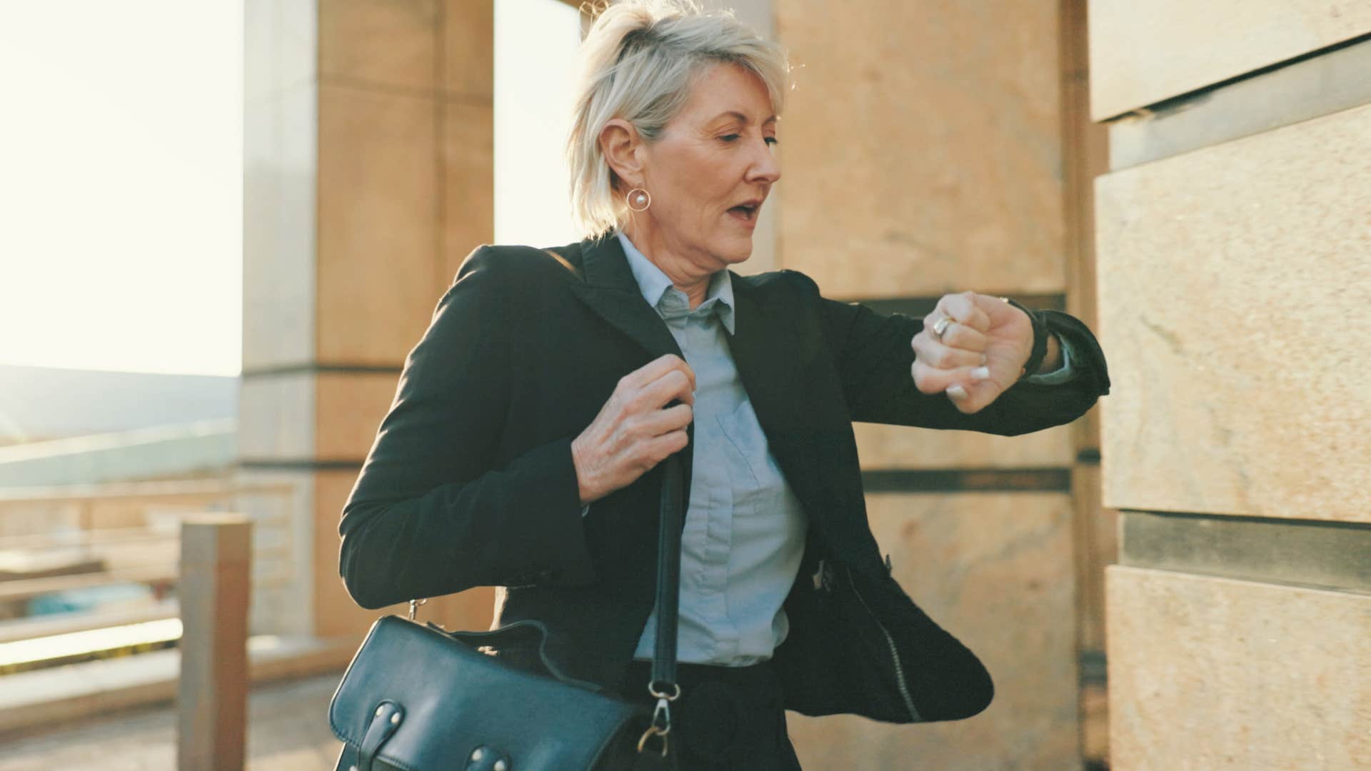 Woman who lives on autopilot rushing to work.