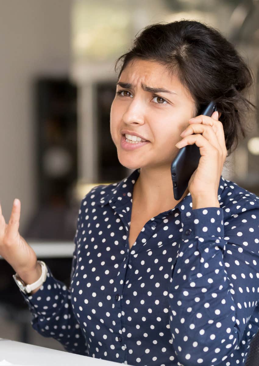 rude woman with horrible manners talking on the phone