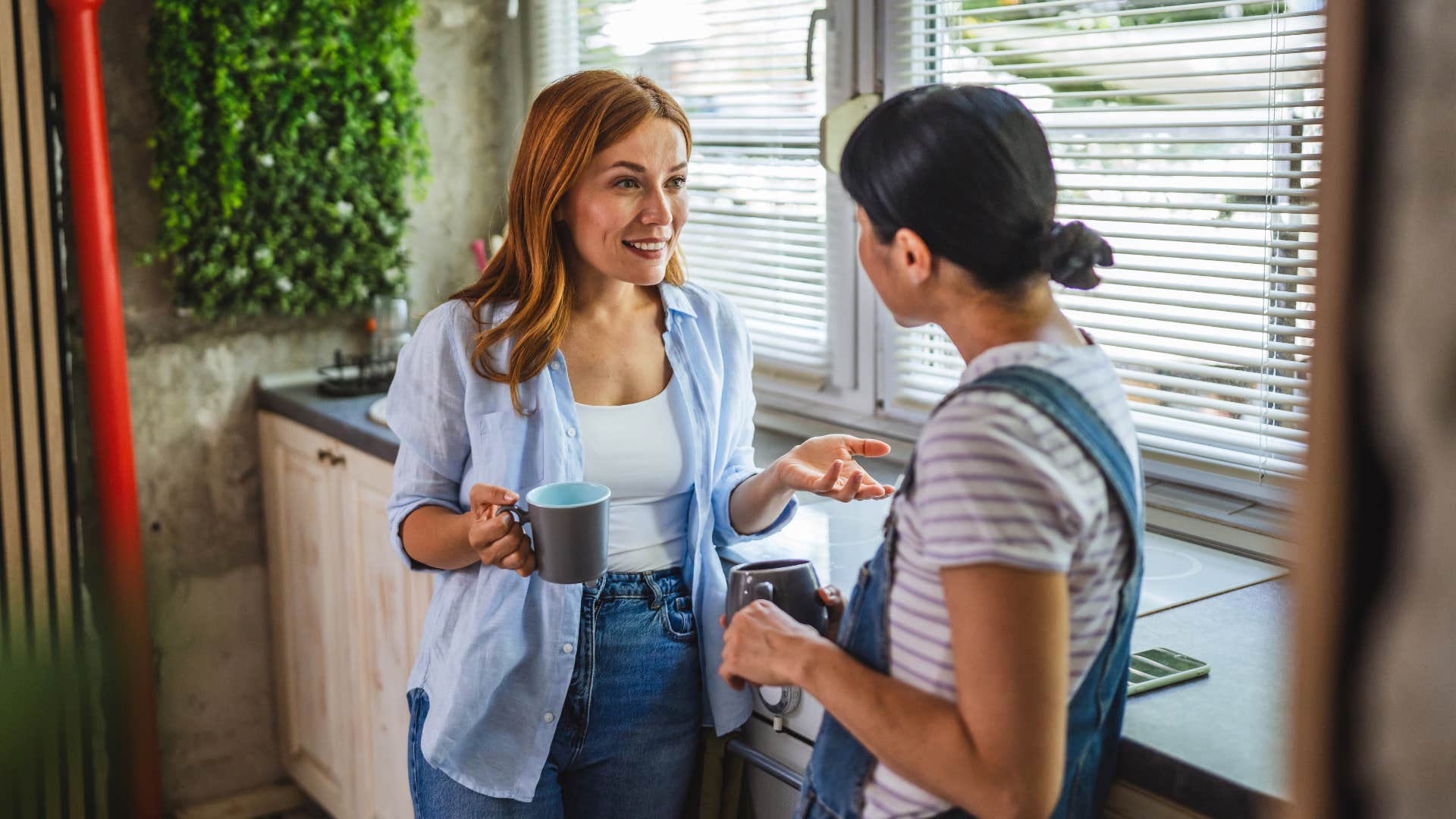 two friends talking with coffee as they never outgrow their friendship