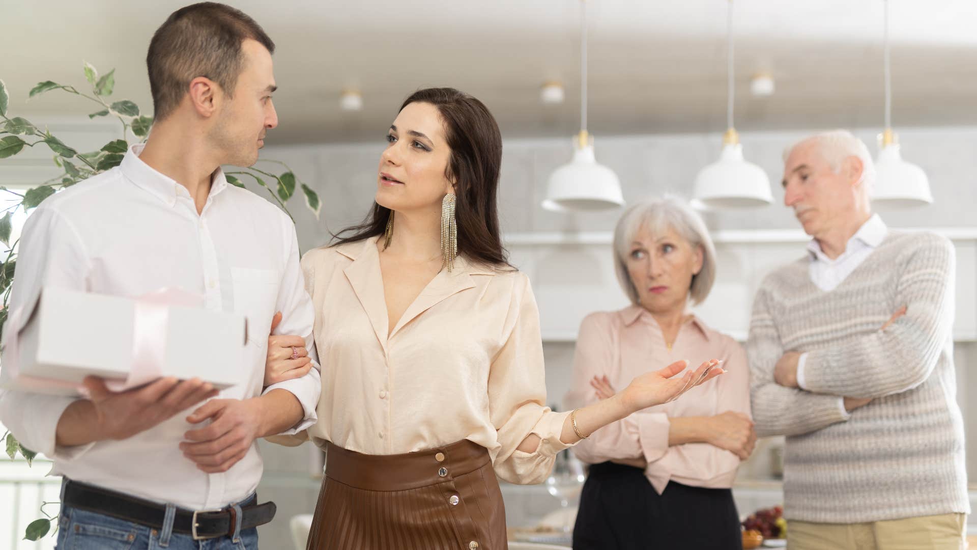 things that were once considered polite but now young generations think are rude showing up unannounced couple annoyed after parents showed up unannounced
