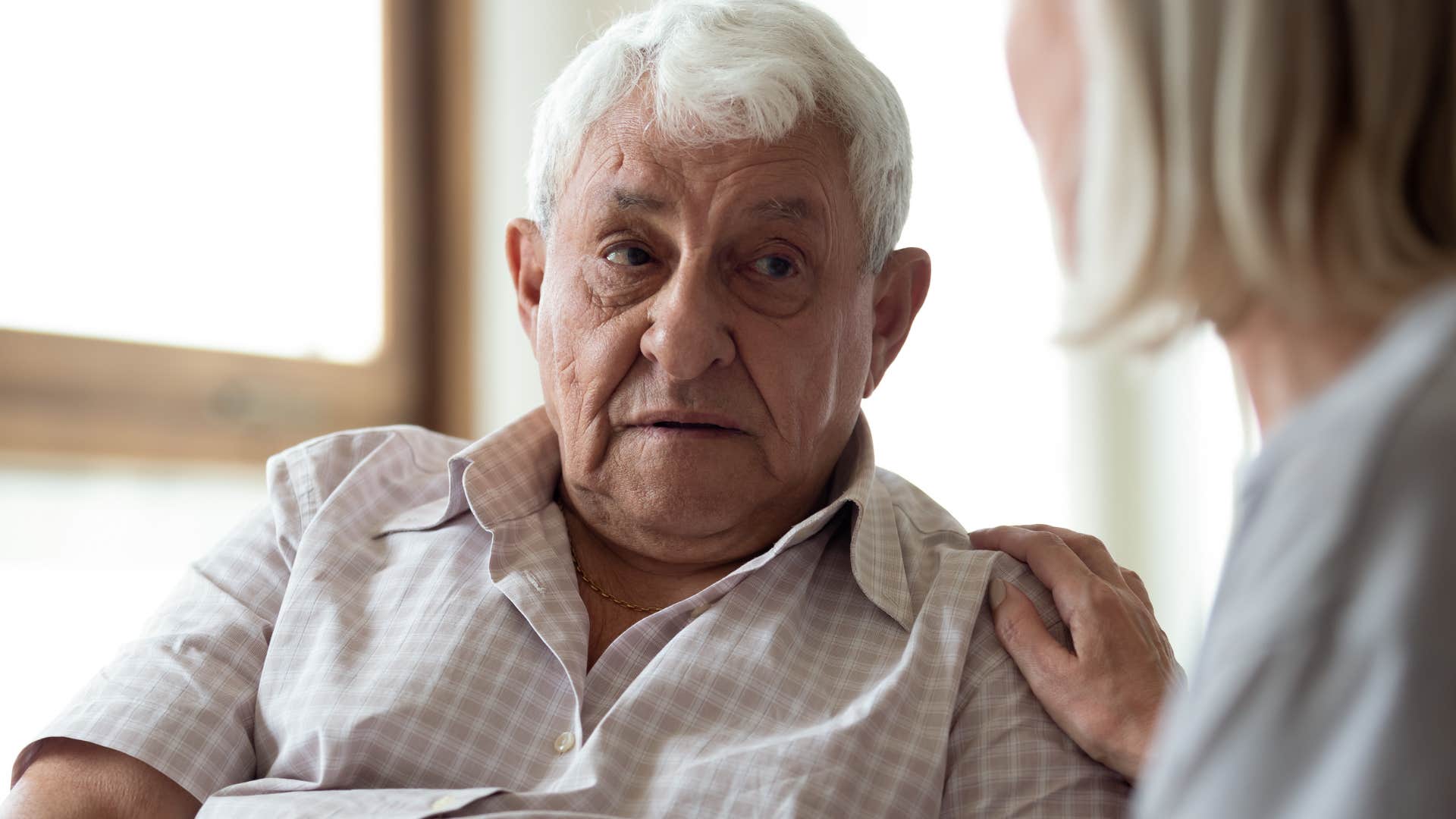 older man criticizing his adult child's lifestyle