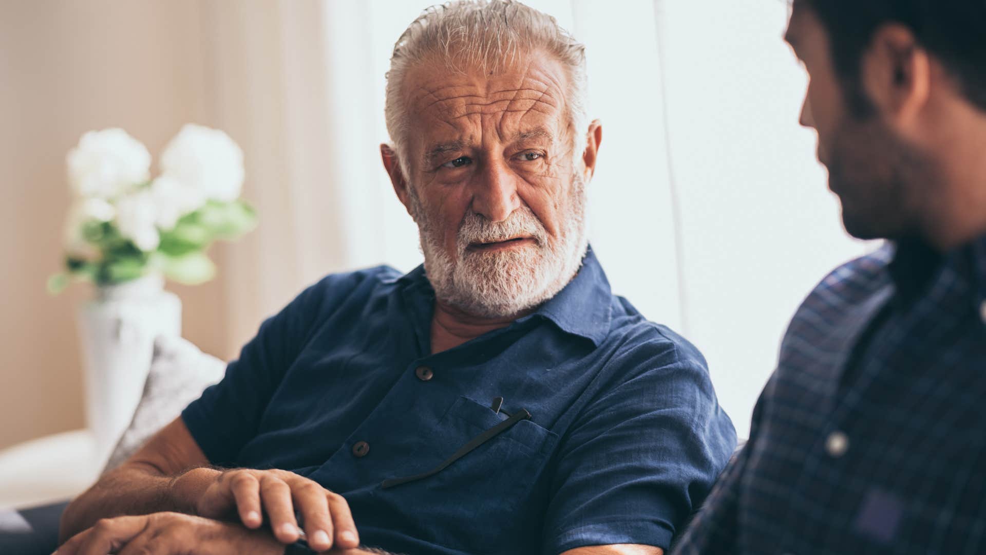father giving unsolicited advice to his adult son