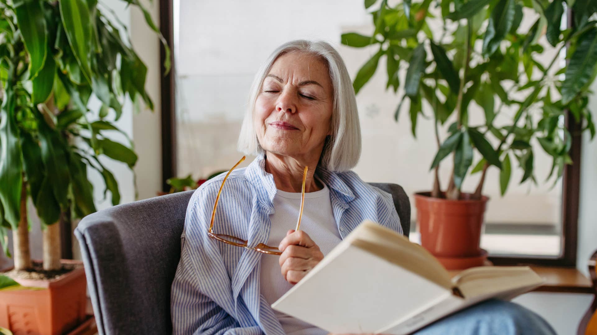 woman relaxing while reading book