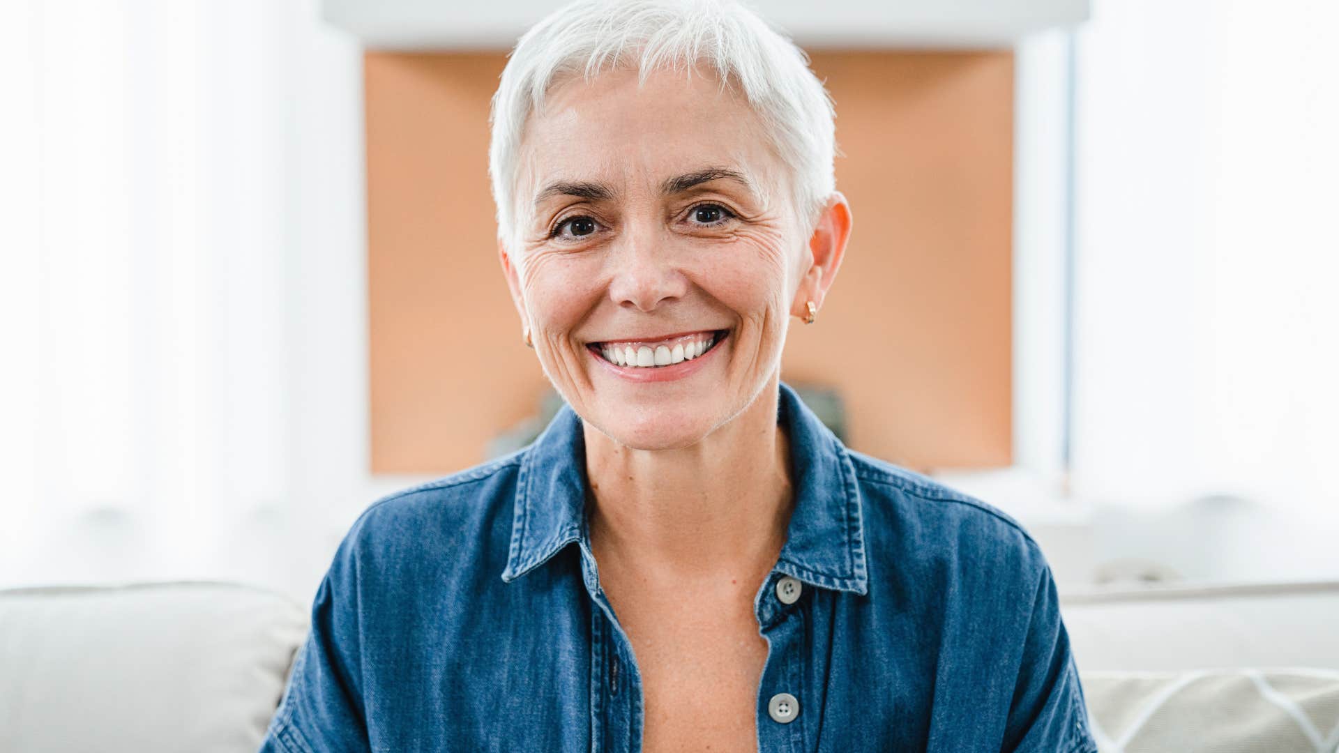older woman smiling at camera