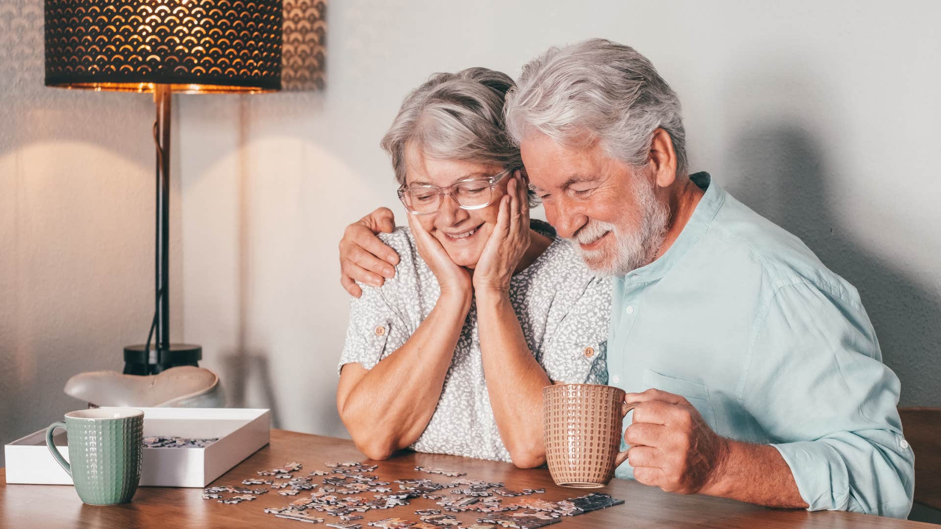 older couple doing puzzle together