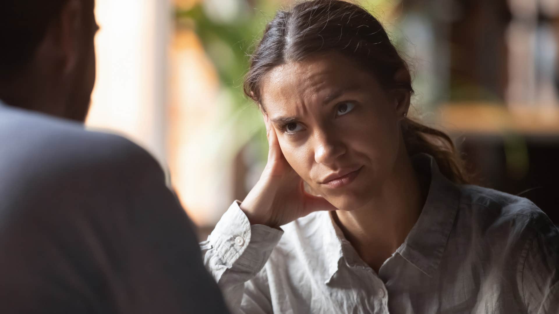 Woman upset being around other emotionally intelligent people.