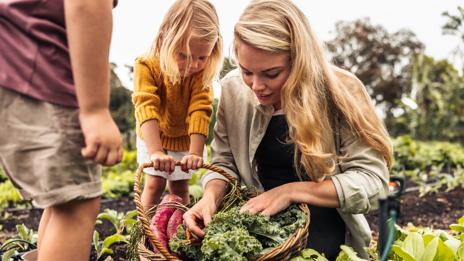 Woman growing her own food at home.