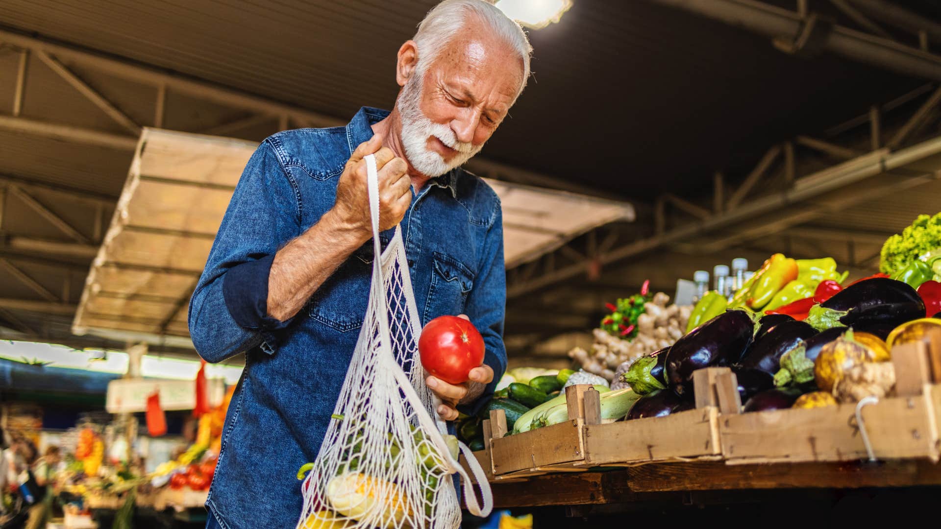 Man shopping locally at the farmers' market.