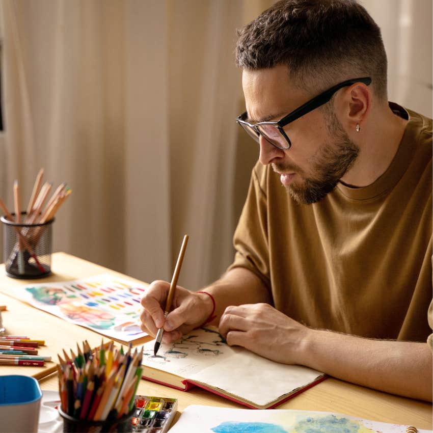 man who is in the top percent of people as he doodles to activate creative mind
