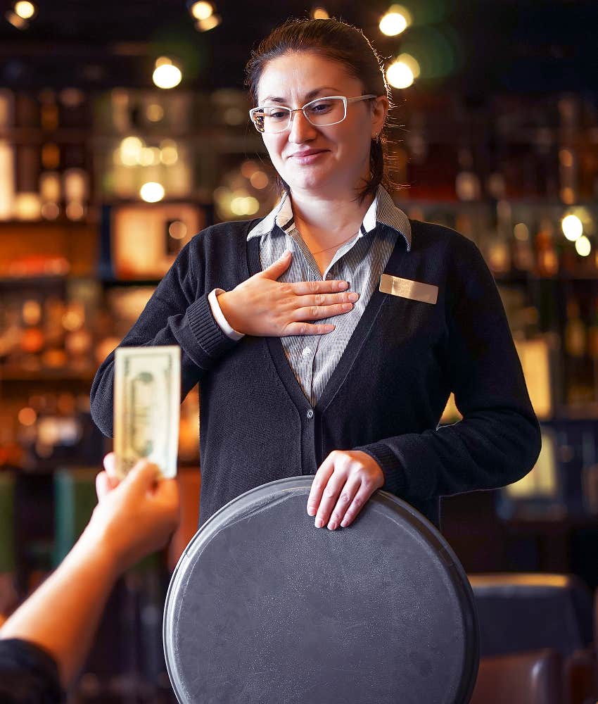 Customer Shopping Online Is Asked To Leave A Tip server receiving tip from customer