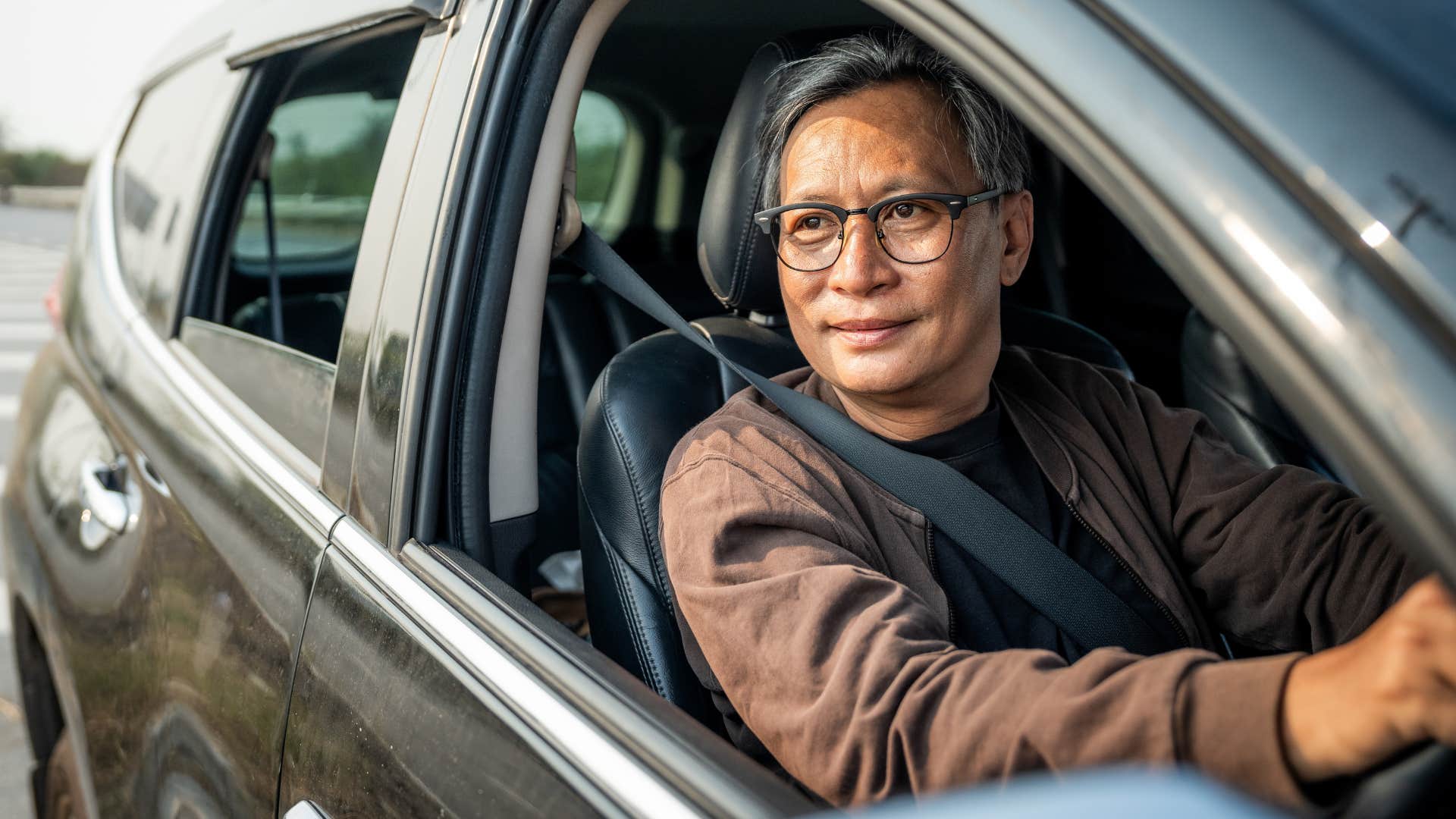 man driving an electric car