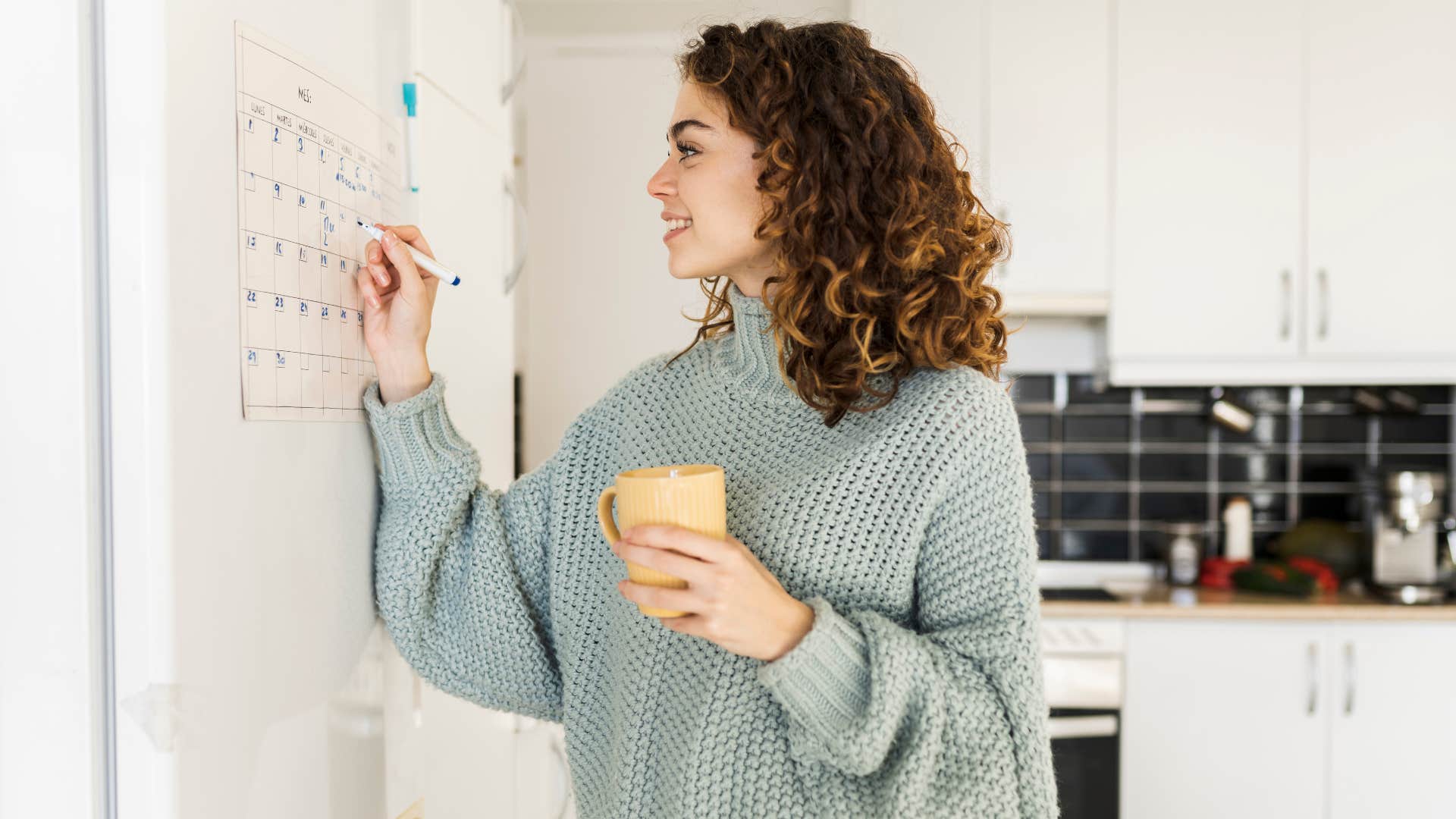 intelligent woman planning on her calendar