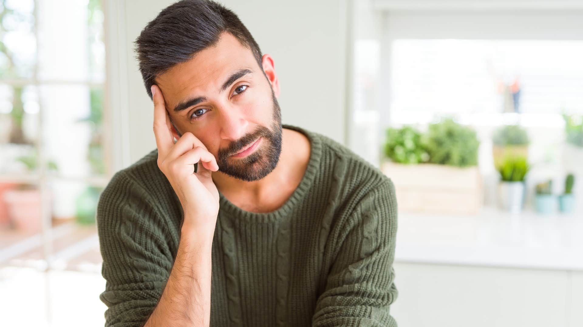 reserved man thinking deeply
