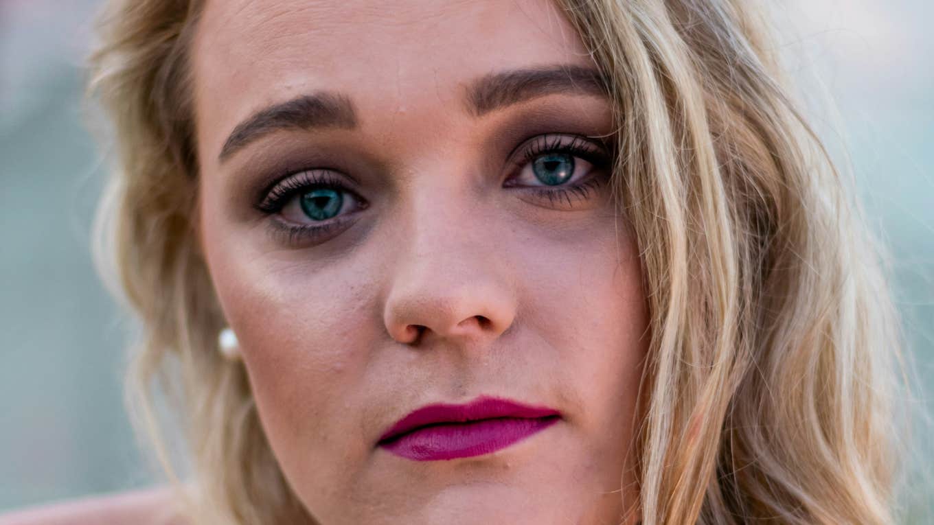 Person feels the world is against them.