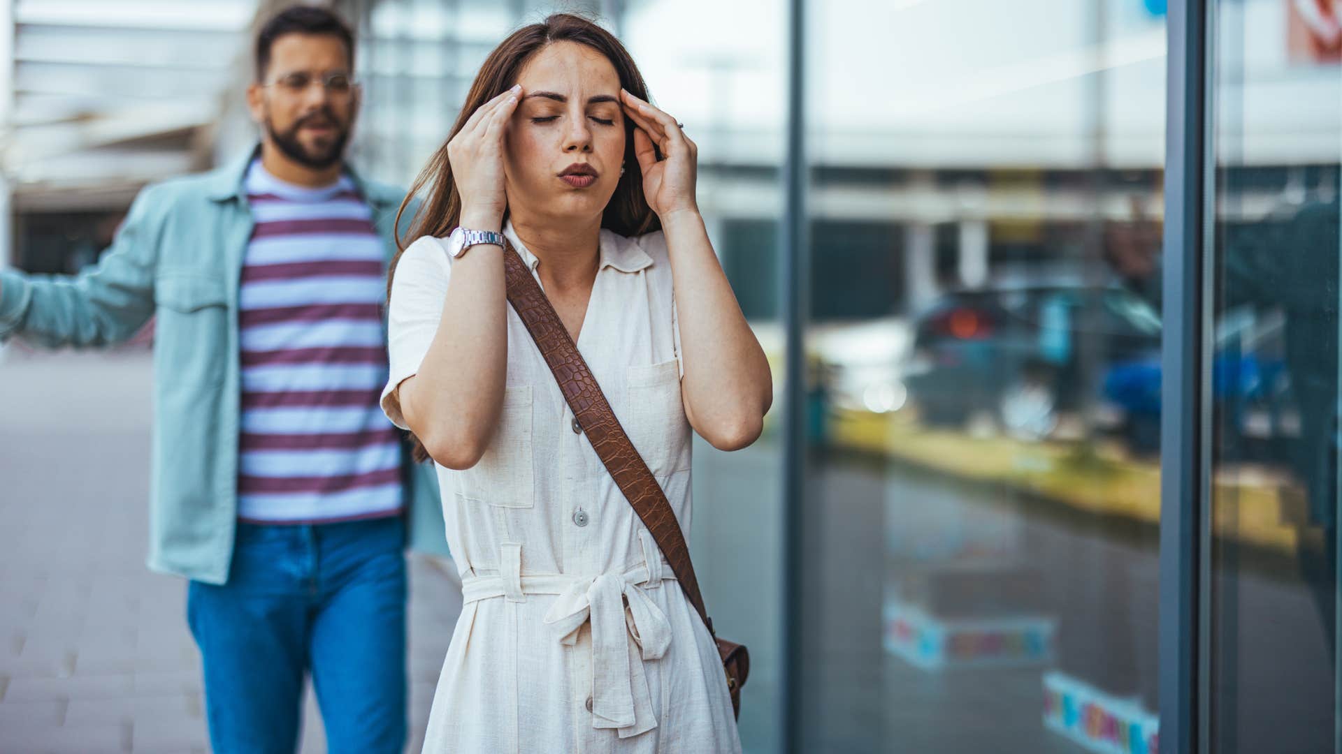 frustrated woman walking away from conversation with man who has to be right