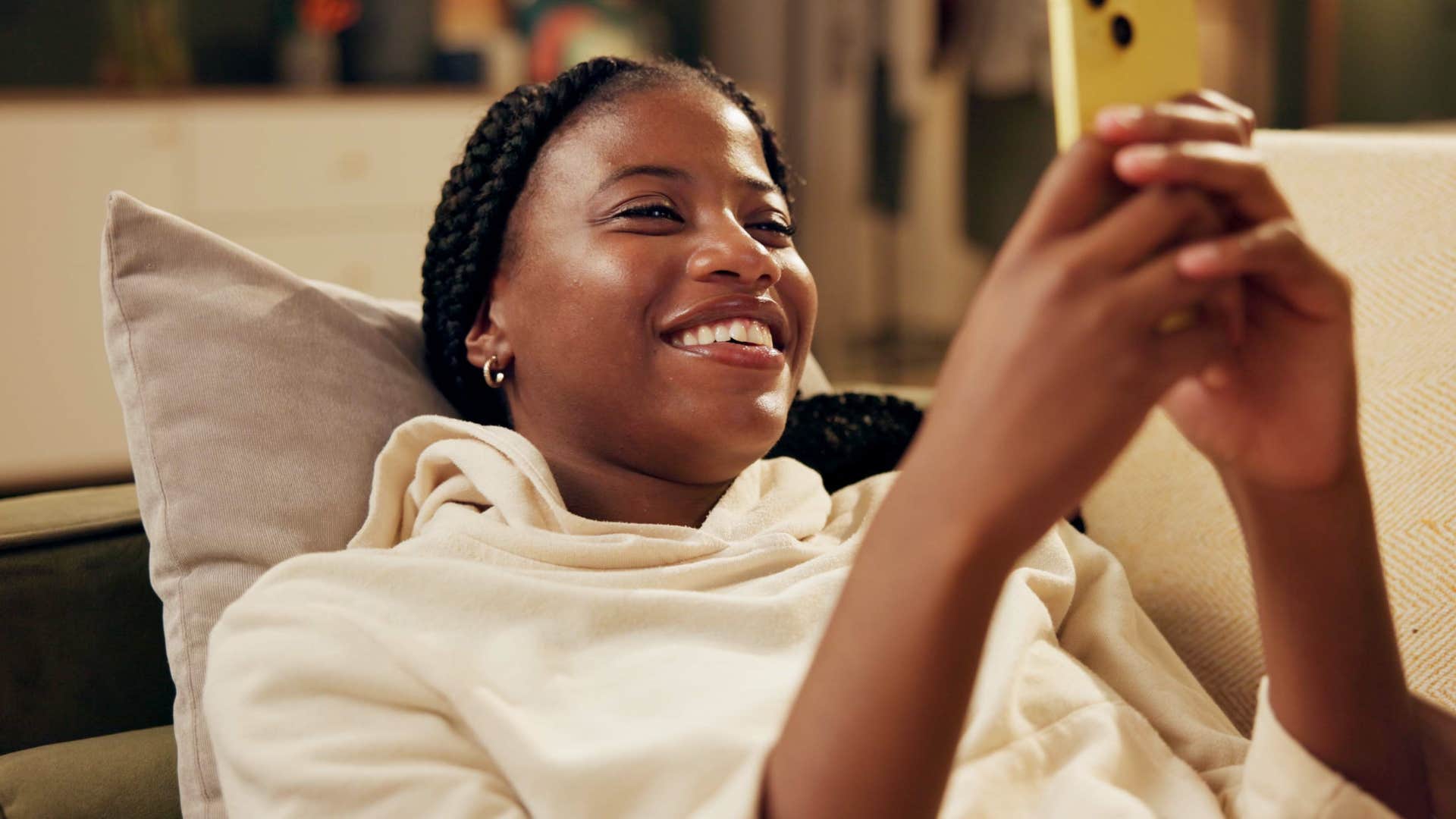 Woman who's intentional texting on her phone.
