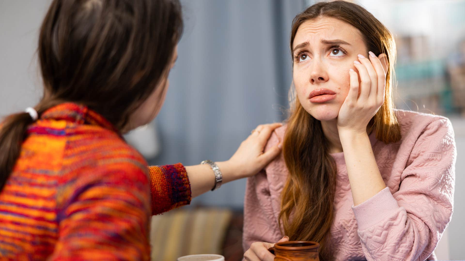 woman comforting friend who's a chronic complainer