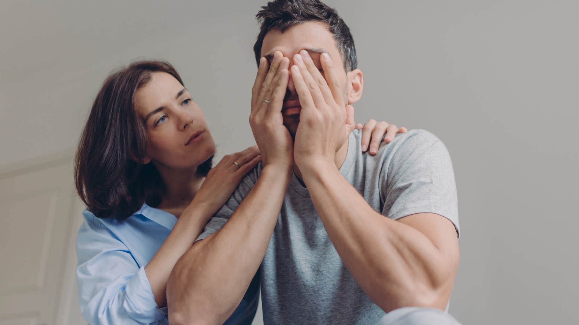 woman comforting man who's a chronic victim