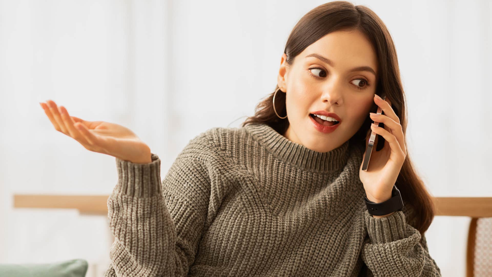 know-it-all woman talking on the phone