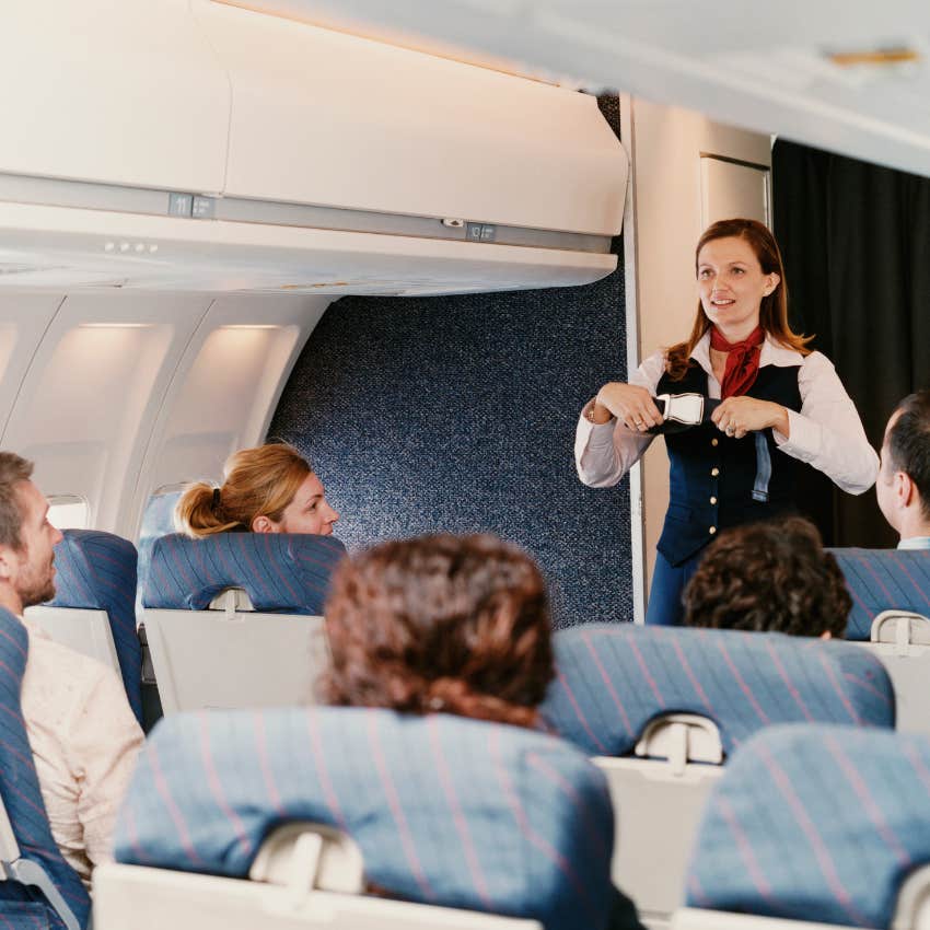 flight attendant doing safety presentation
