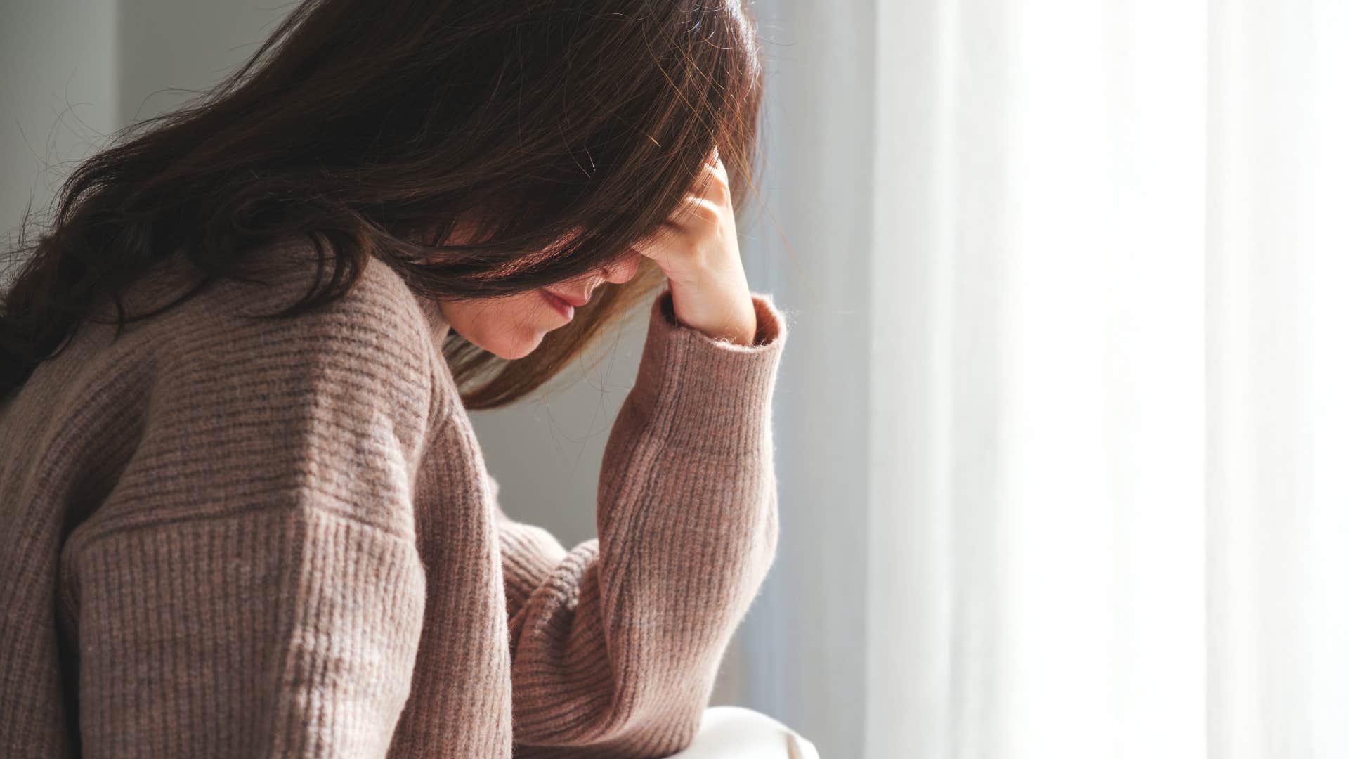 woman whose ego is quietly dying with the dark night of the soul