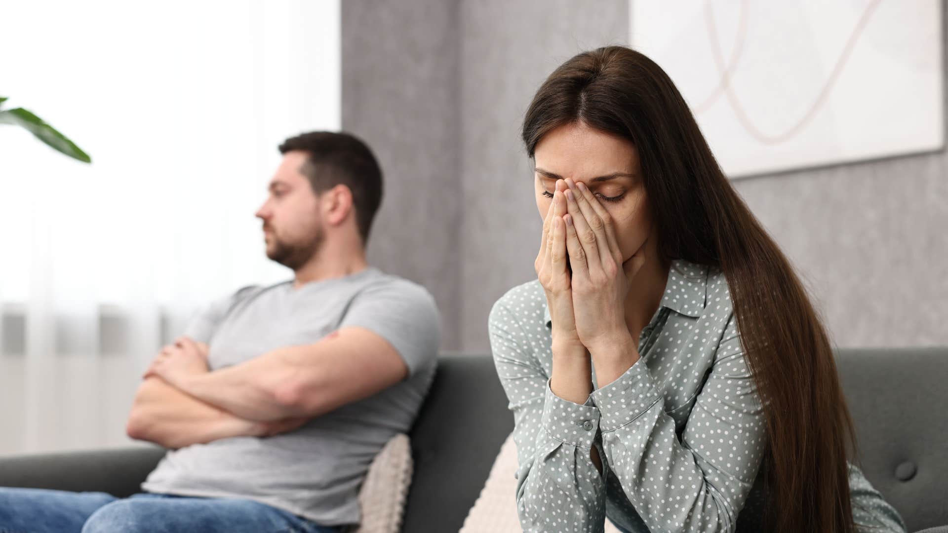 woman avoiding playfulness and laughter with her husband