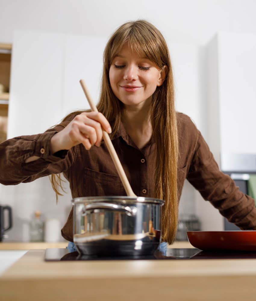 woman cooking in apartment