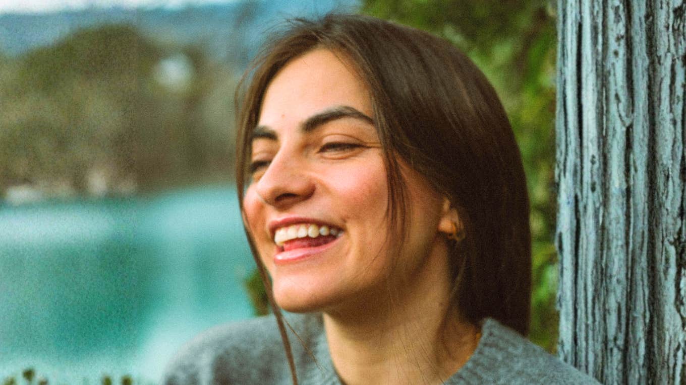 Woman Diagnosed With Painful Life-Long Condition Declared She Was Going To Be Happy (And It Worked) Woman declaring she was going to be happy, with a painful life long condition.