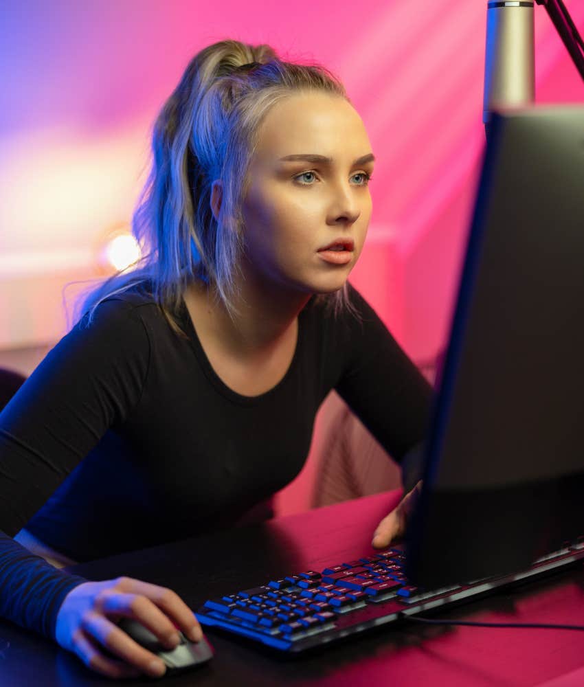 woman playing on her gaming system before her nephew broke it