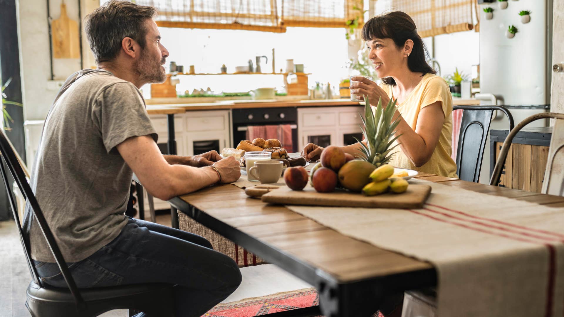 couple eating together conversing well