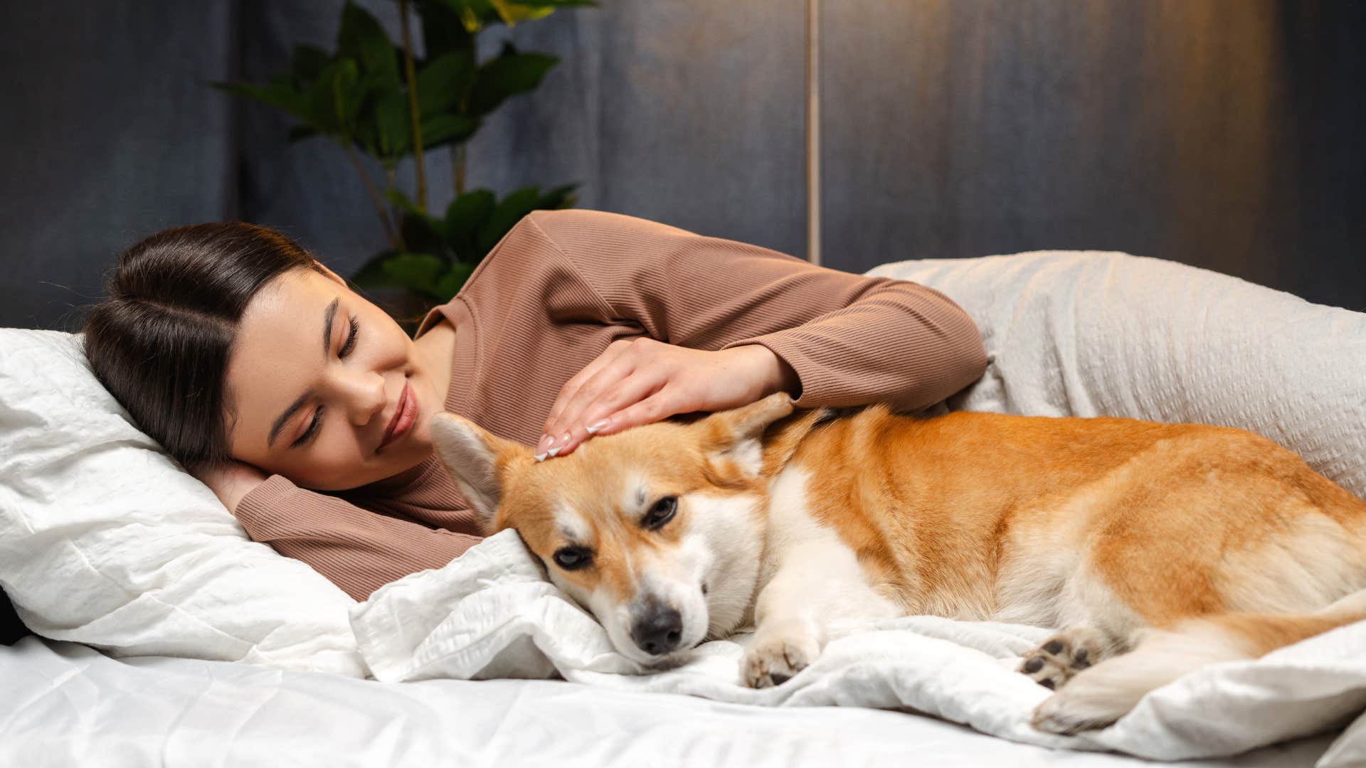 woman spending quality time with her dog
