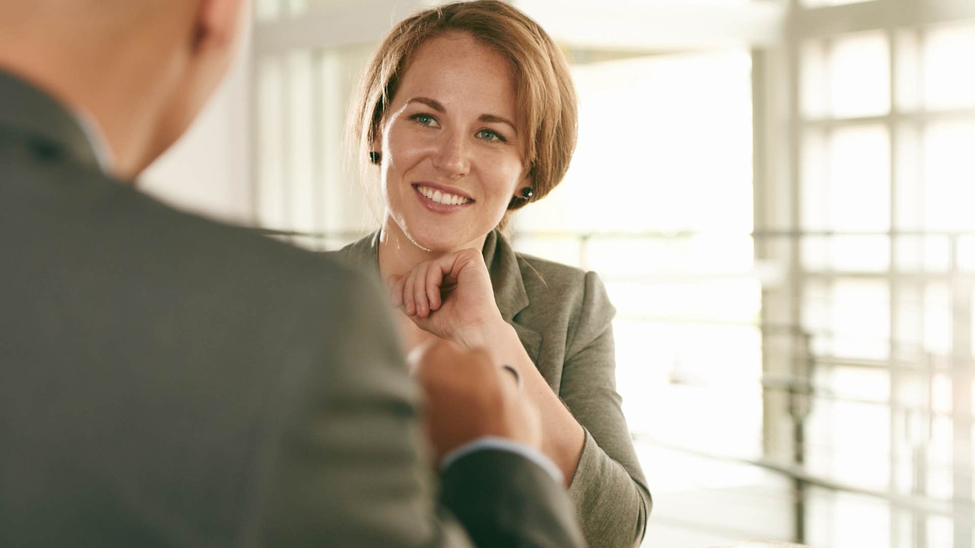 woman discussing her success at work