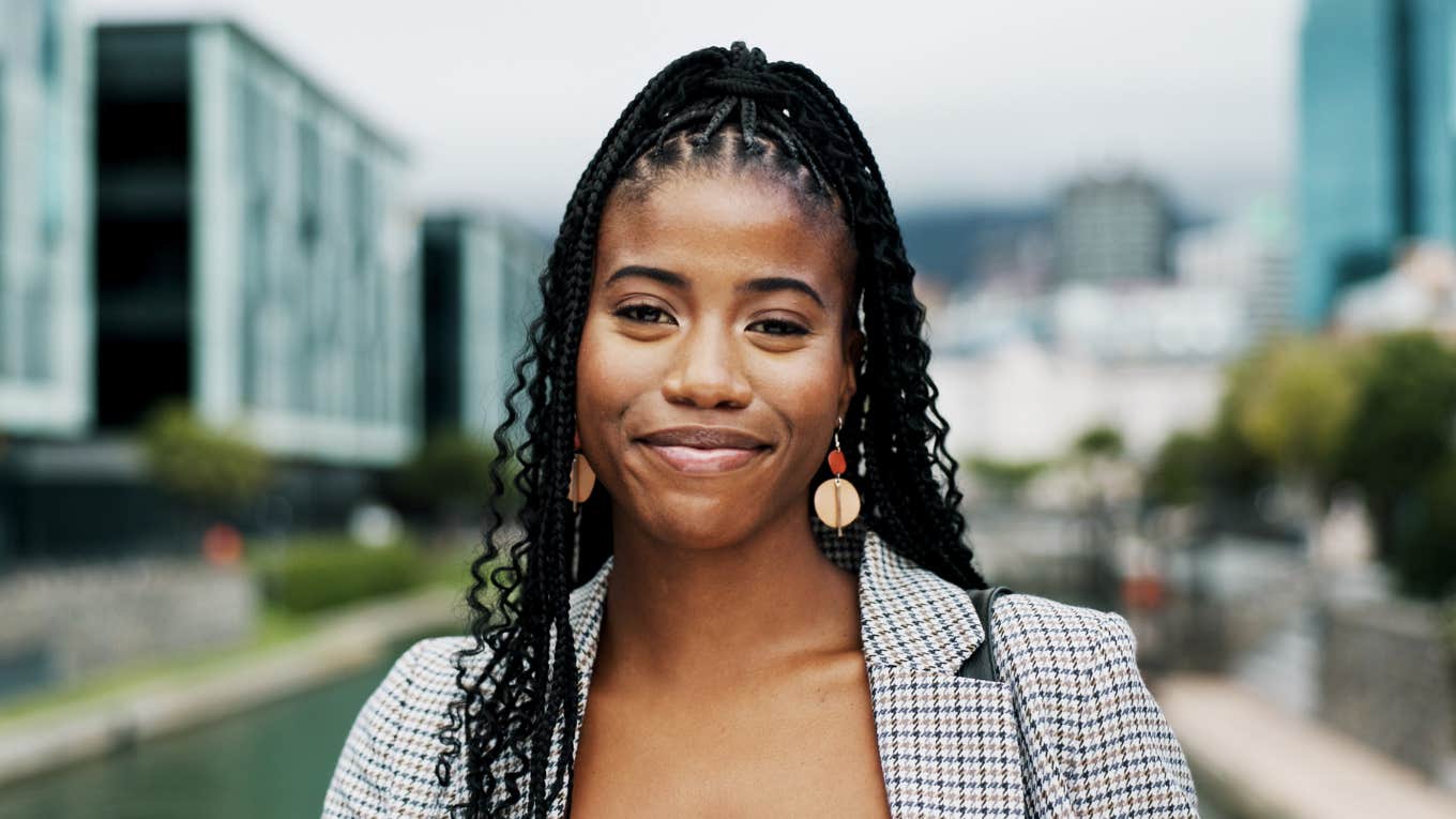 Happy employee leaving work on time showing the art of balance and the small signs a company respects life outside work.