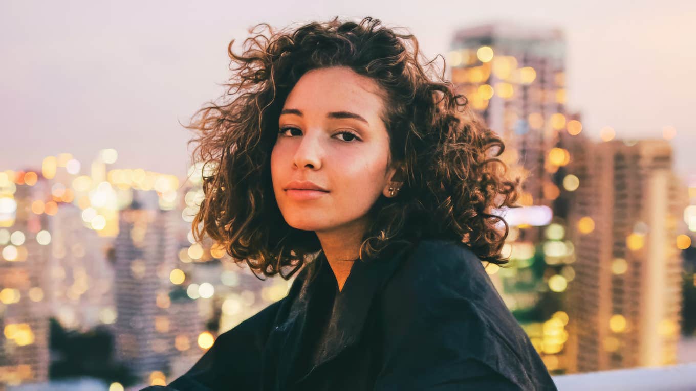 Calm grounded person reflecting quietly showing the art of emotional courage and the habits of people who process their feelings in a healthy way