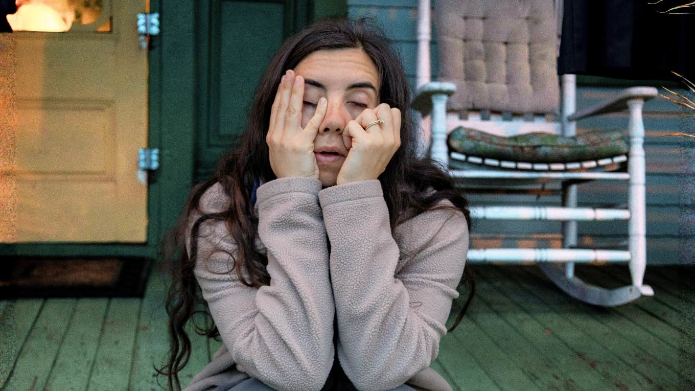 Exhausted overwhelmed person resting their head on their hand showing the art of feeling human again and the hidden reasons people feel so exhausted.