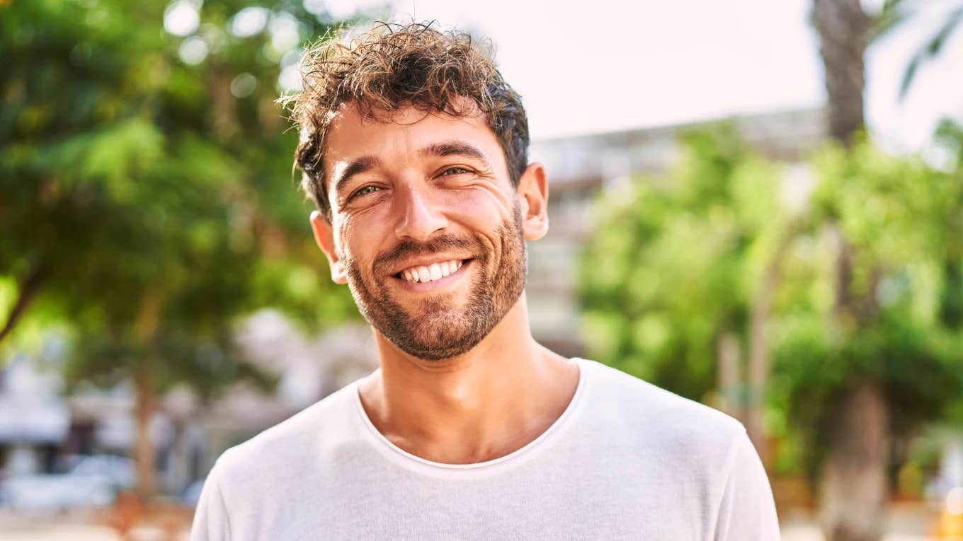 Attractive confident man with calm, focused expression representing emotional maturity, strength, and the loving behaviors of real men who know how to cherish and respect good women.